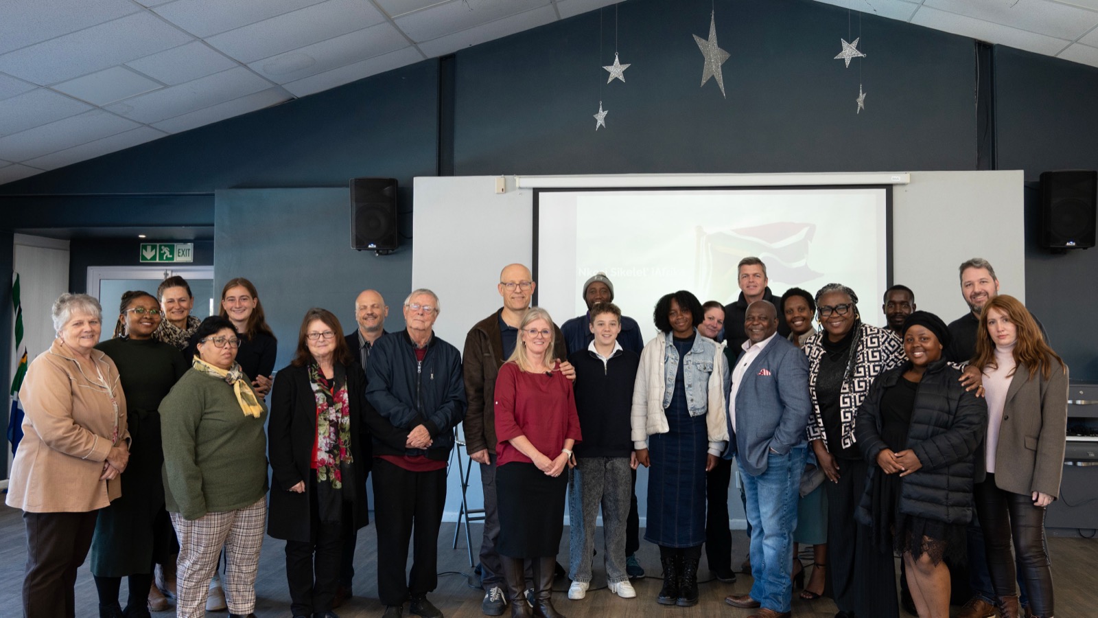 Group photo from the first National Interests & Friends gathering, 16 May 2026